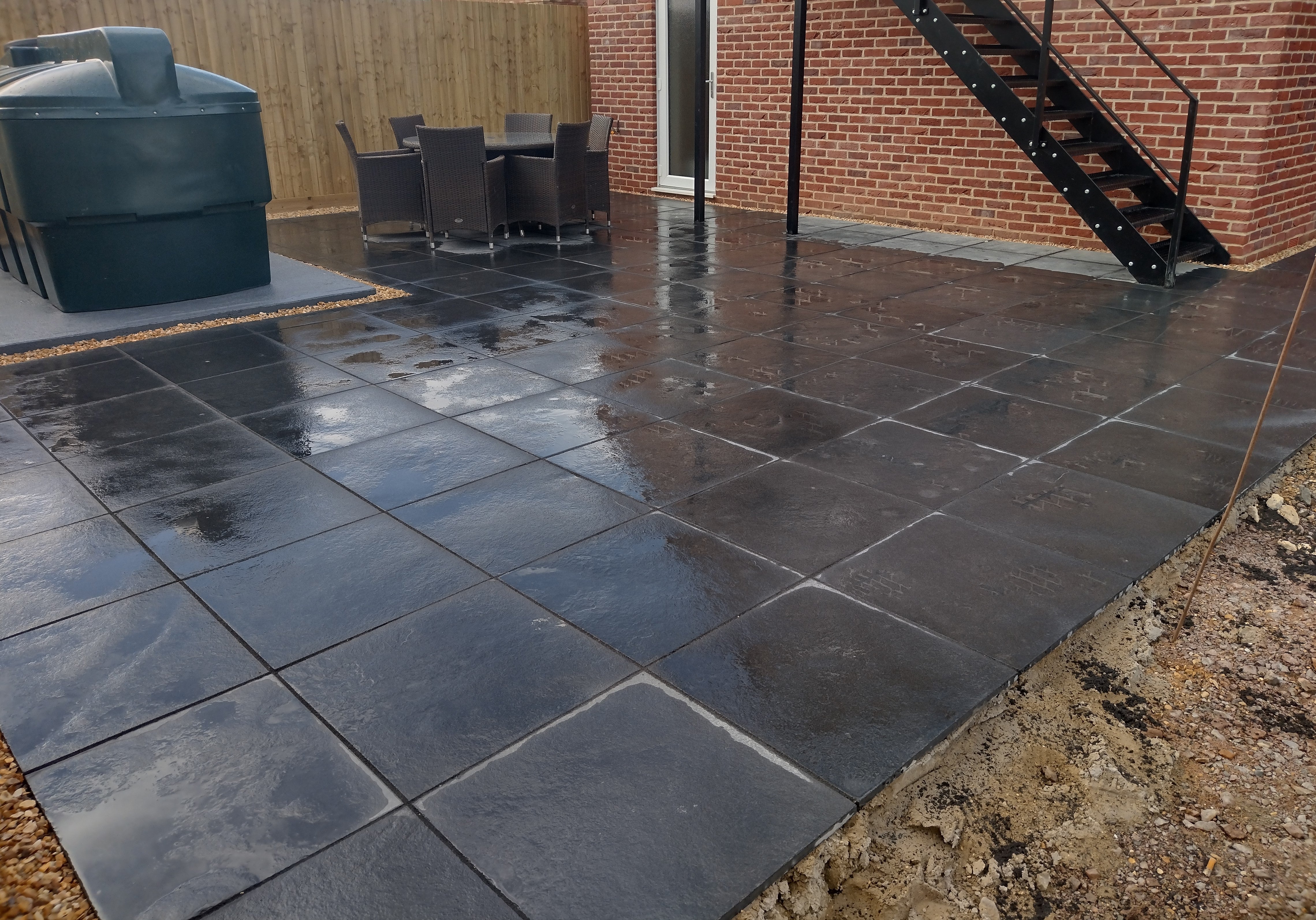 Black Natural Indian Limestone Paving Slabs - Riven - Sawn Edge - 600x600 - 22mm