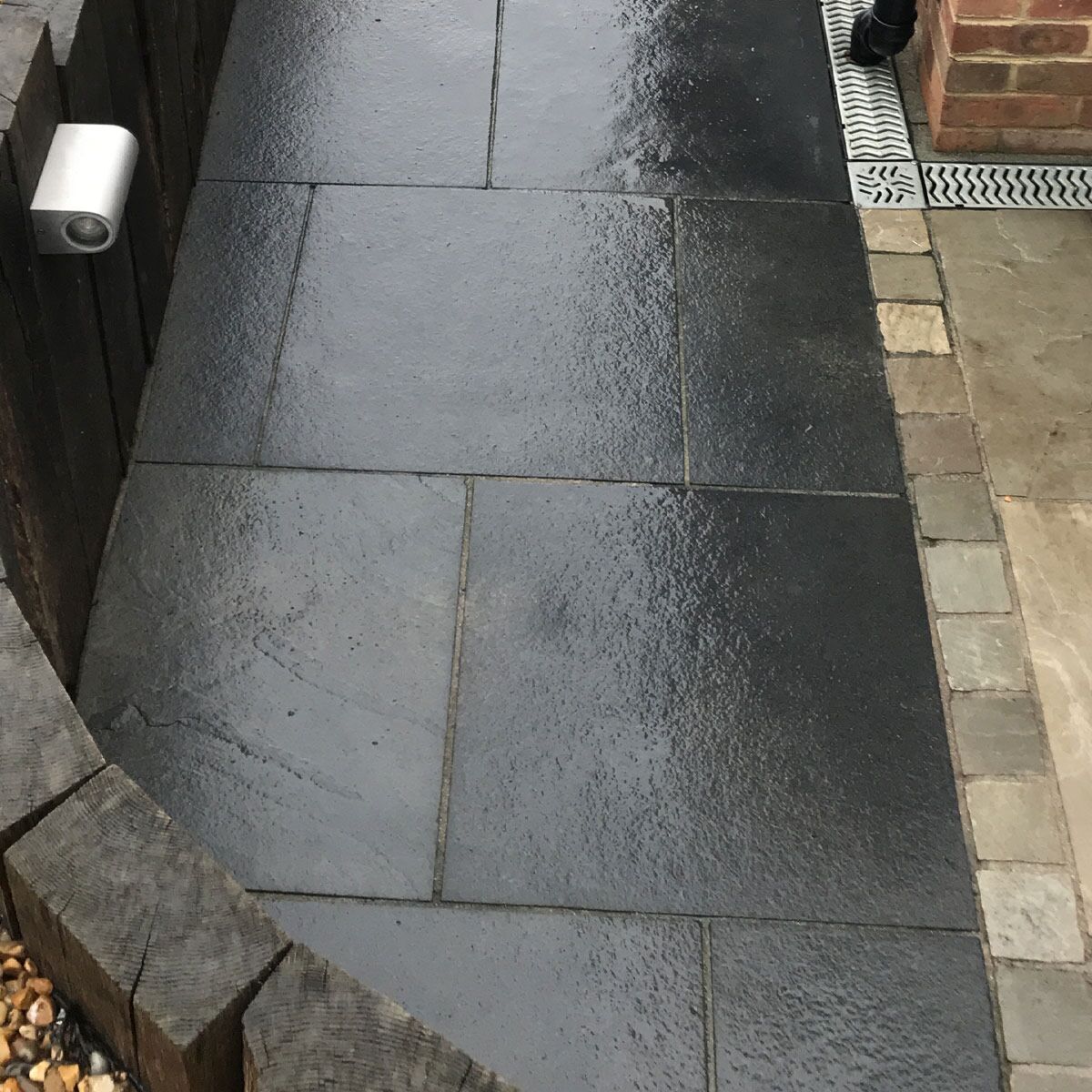 Black Natural Indian Limestone Paving Slabs - Riven - Sawn Edge - 600x600 - 22mm