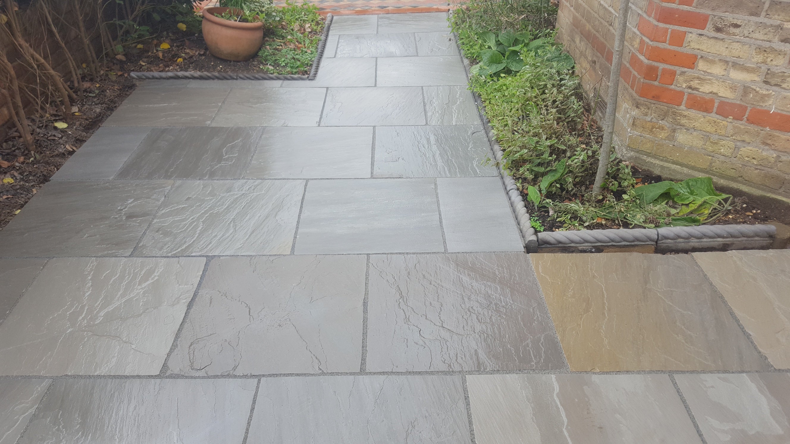 Kandla Grey Indian Sandstone Paving Slabs - Riven - 600x600 - 22mm