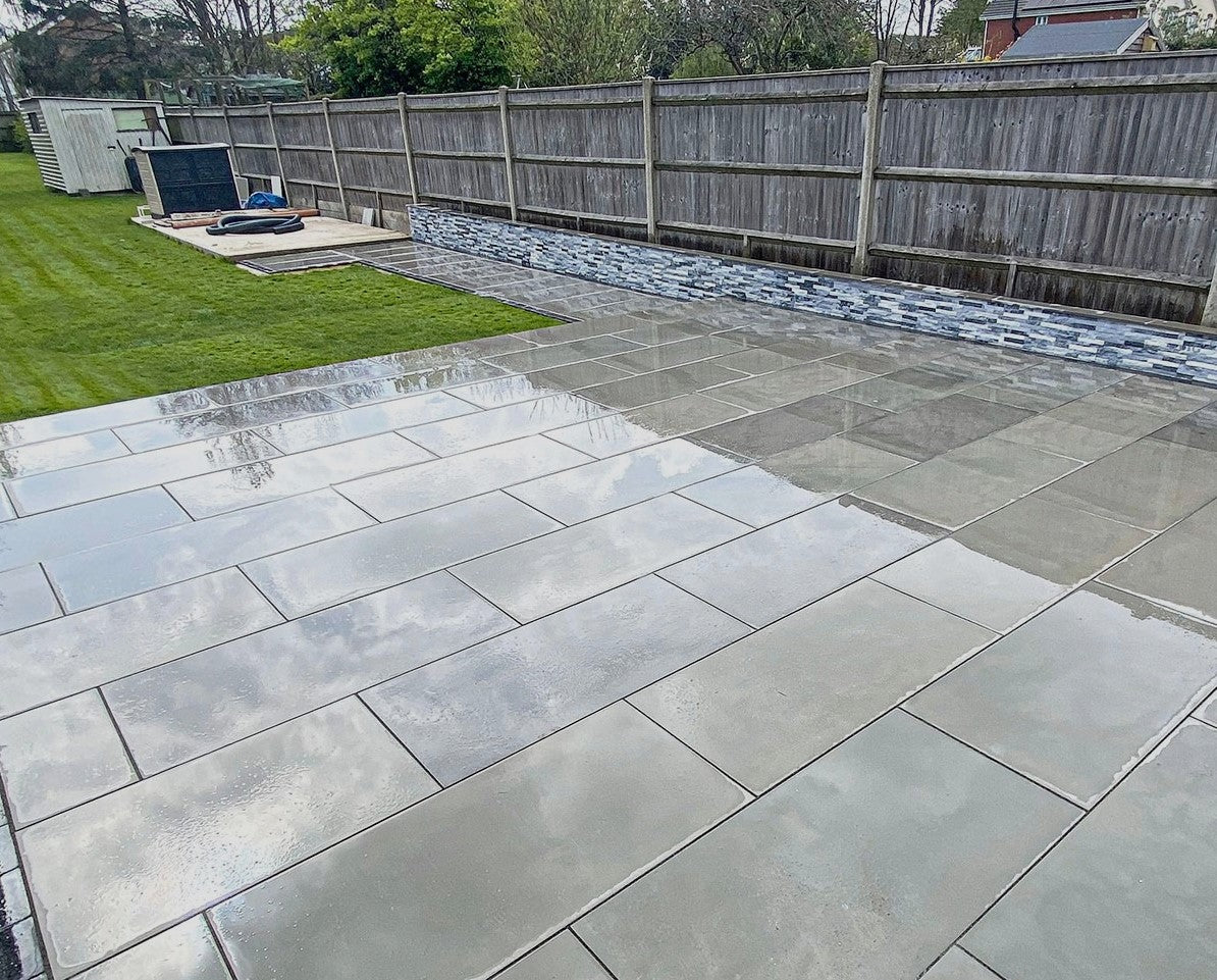 Kandla Grey smooth sawn and honed sandstone in 1200x600 paving size