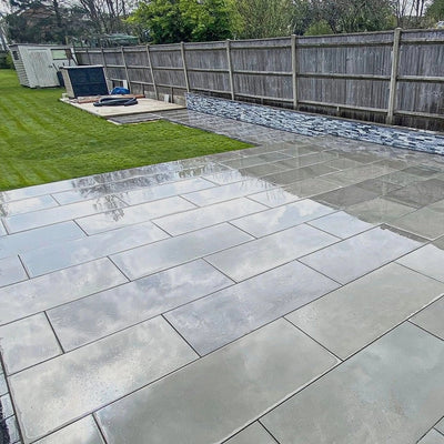 Kandla Grey smooth sawn and honed sandstone in 1200x600 paving size